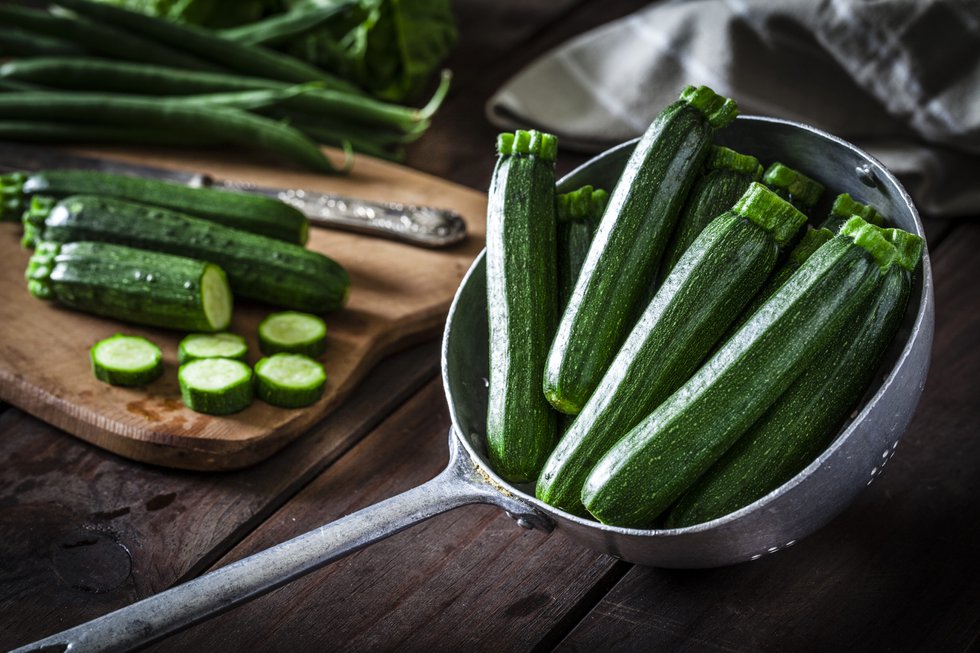 Zucchini in an old metal colander