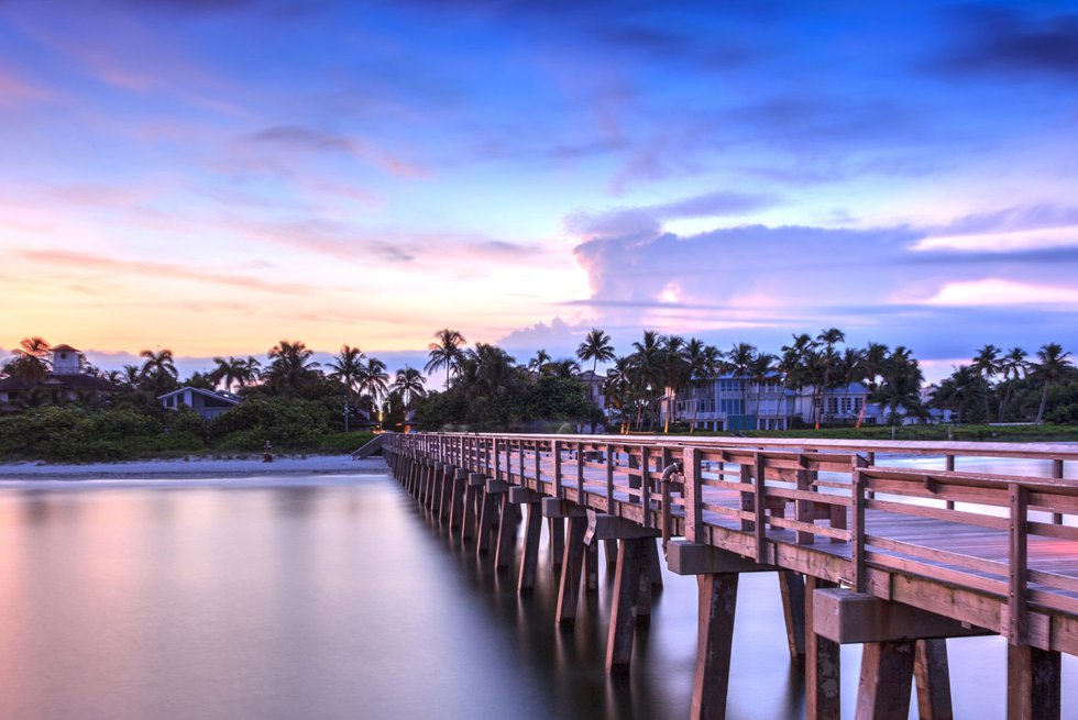 Bridge Over River Against Sky During Sunset