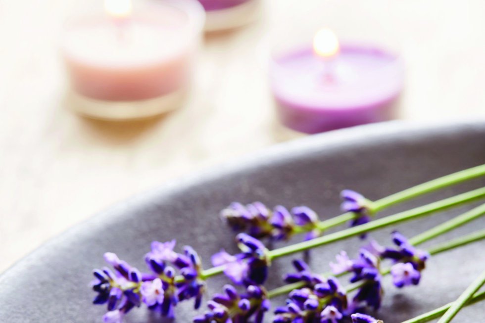 Lavender flowers and candles, aromatherapy