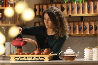 Woman pouring Estero Bay Tea