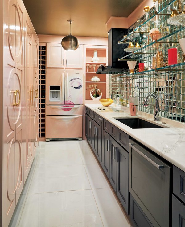 Kitchen with pink cabinets and gold glassware.jpeg