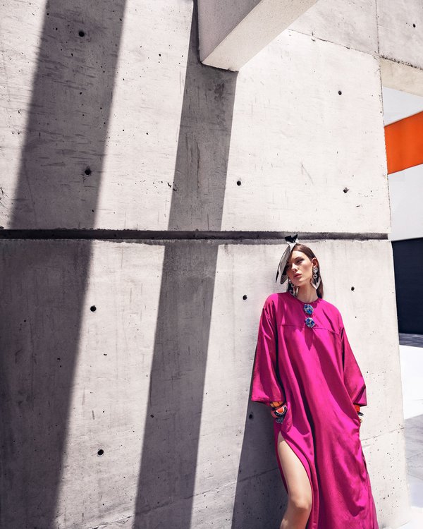 Model posing in pink dress.jpg