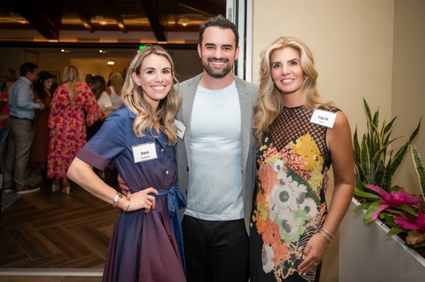 Three people posing at Zoo Gala patron party.jpg