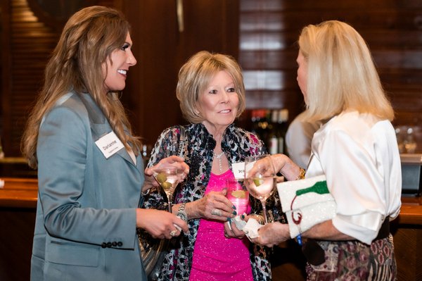 Woman enjoying Zoo Gala patron party.jpg