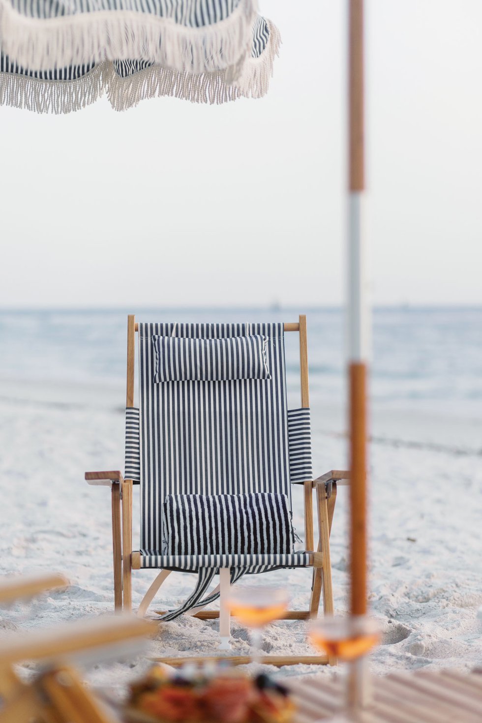 chair and umbrella setup on naples beach