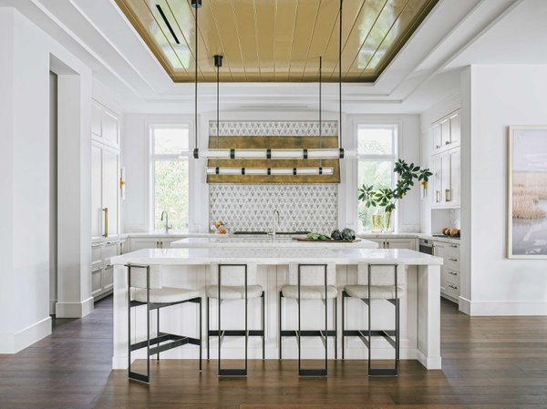 White kitchen with wooden accents.jpeg