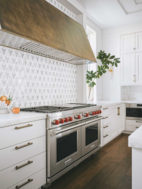 White kitchen with silver appliances.jpeg