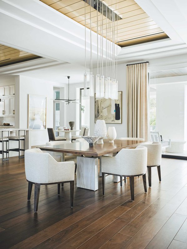 Neutral dining area with wooden floors.jpeg