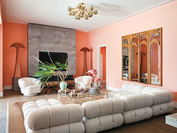 Pink living room with white leather couch.jpeg