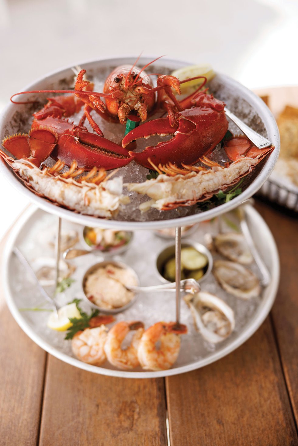 seafood tower with a whole Maine lobster and Gulf shrimp