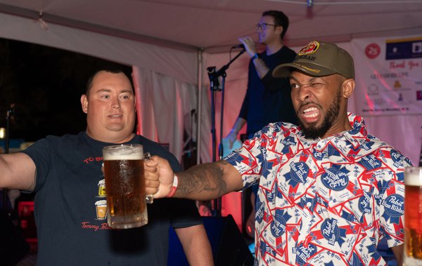 Two men enjoying festival