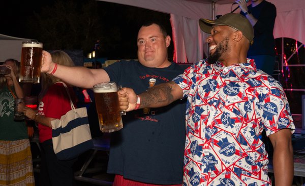 Two men enjoying festival