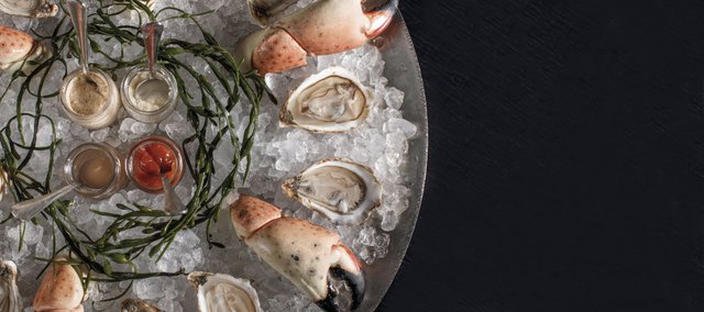 stone crab claws and oysters on ice