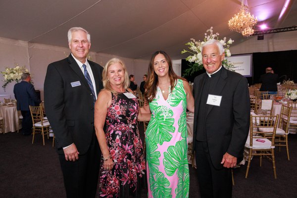 Scott Burgess, Caryn Hacker-Buechel, Brianna Kay, Father Orsi.jpg